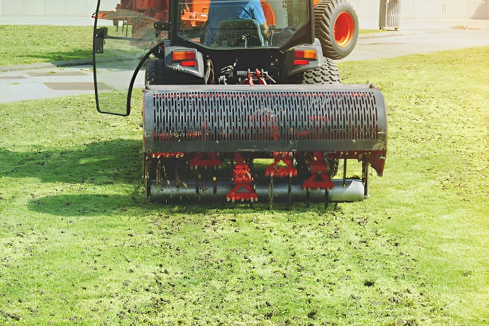aerating a lawn with aerator