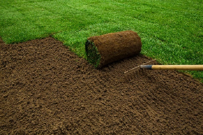 image of soil plowing before sod installation