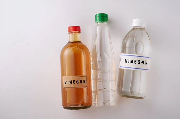 image of vinegar and water to kill lawn weeds not flowers