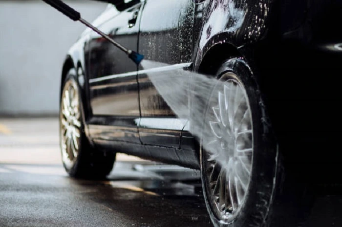image of a car wash with the waste water of hot water tub