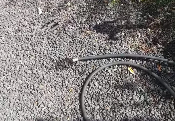 image of hot tub water drainage around the house