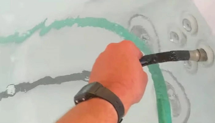 image of draining water from a hot tub 