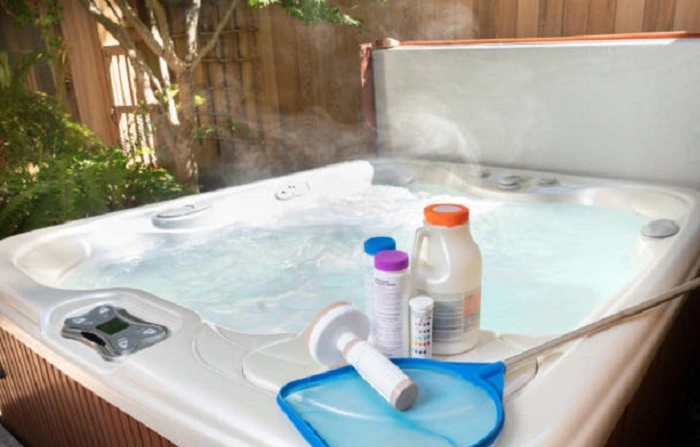 image of bromine and some other chemicals near a hot water tub
